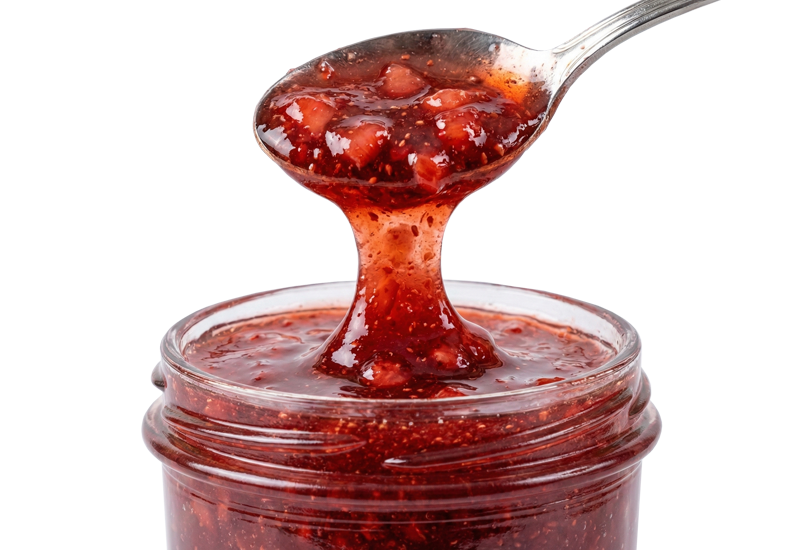 Ketchupflasche und Tomaten