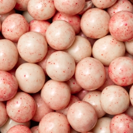 Knusprige Kugeln in weißer Schokolade mit Himbeeren