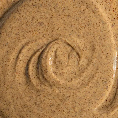 Mandelcreme mit weißer Schokolade und Kokosraspeln